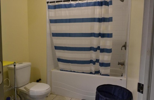 Forest Lawn House | Private Bedroom in Basement with Shared Bathroom - Fonda