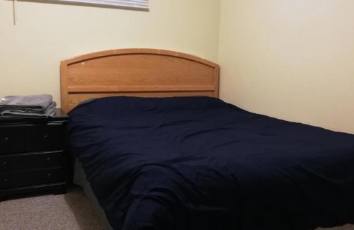 Forest Lawn House | Private Bedroom in Basement with Shared Bathroom - Fonda