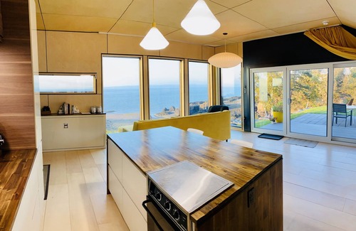 Kings County House | Private Coastal Waterfall Escape, for Couples- Tides, Sauna, 55' Ocean Falls