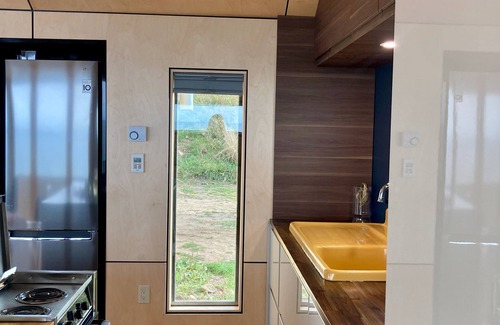 Kings County House | Private Coastal Waterfall Escape, for Couples- Tides, Sauna, 55' Ocean Falls