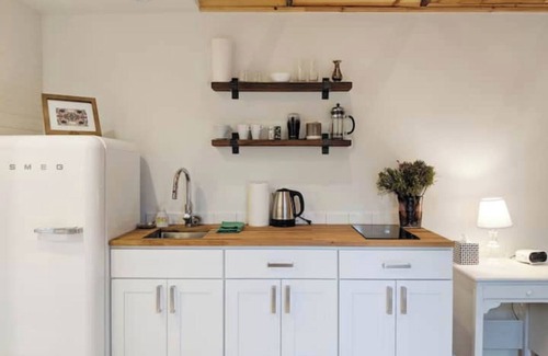 Central District Apartment | Private Cottage in urban oasis