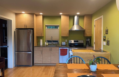 Matthews Beach Cottage | Private Cottage with soaring vaulted ceiling