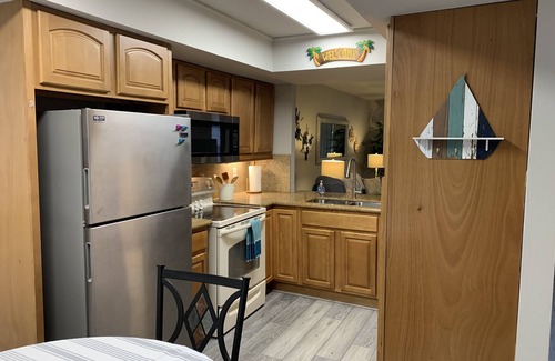 Yacht Club Condo | Private first floor condo in the HEART of it all!