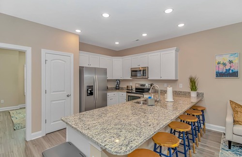 Downtown Myrtle Beach House | PRIVATE HOT TUB, steps from the beach, boardwalk and many other attractions.