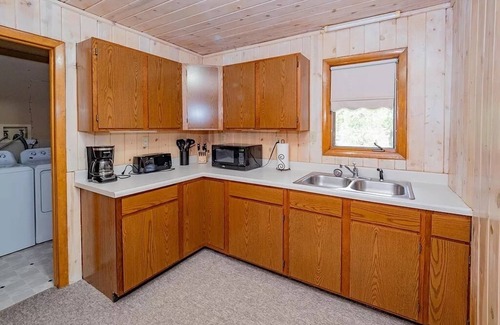 Delton House | Private Lake Front Home With Pontoon Rental Available On Property