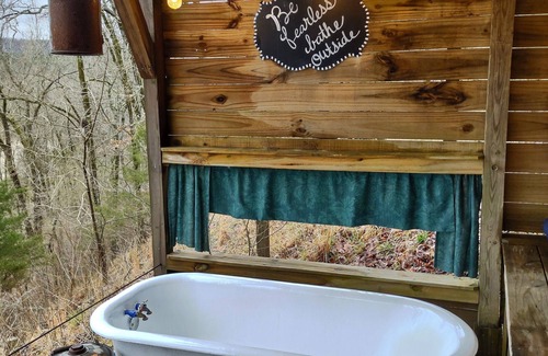 Caddo Gap RV Rental | Private River Tent Camping with Kayaks & Outdoor Bathhouse! Pet friendly!