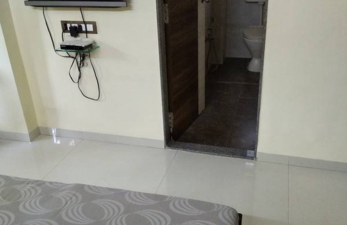 J B Nagar Resort | Private room ∙ 2 guests