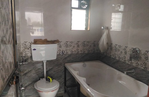 Malad West Resort | Private room ∙ 4 guests