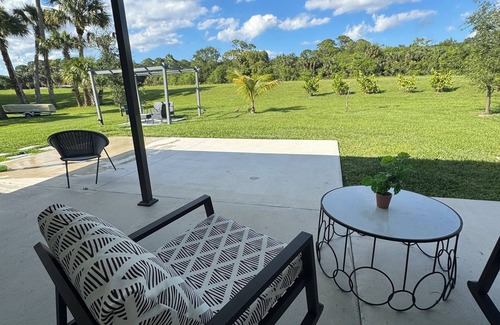 Port Saint Lucie Apartment | Private Tropical Guesthouse · Hot Tub + Patio in Port St. Lucie