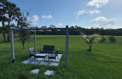 Port Saint Lucie Apartment | Private Tropical Guesthouse · Hot Tub + Patio in Port St. Lucie