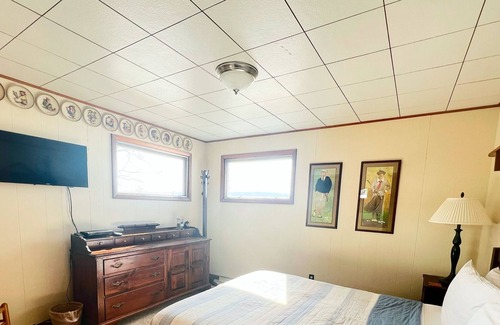 Interlochen Cabin | Private waterfront home in Interlochen. Rowboat, kayaks. Pet friendly.