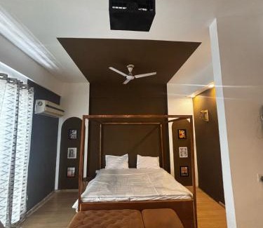 Gomti Nagar Apartment | Projector room by stayease