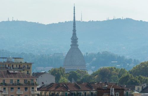 Borgo Dora House | Pronto Soccorso per Globe Trotter, vista sulle Alpi, aria condizionata, bagno condiviso
