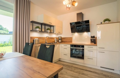 Wangerland Apartment | Pure North Sea flair: relaxation in the 'Lüttje Parl' vacation apartment in Hooksiel