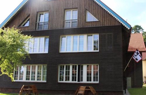 Juodkrante Apartment | Purple Amber