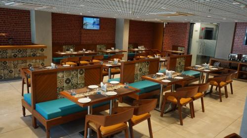 Surat Hotel | Purple Beds by VITS Dwarkesh, Surat