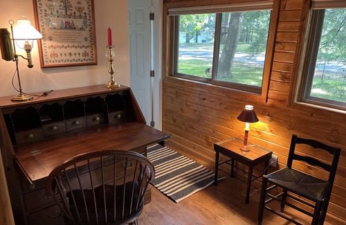 Harrison Cabin | Quaint and cozy log and knotty pine cabin close to lakes.