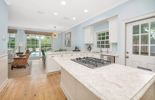 East Beach House | Quaint beach cottage with pool just steps to the beach.