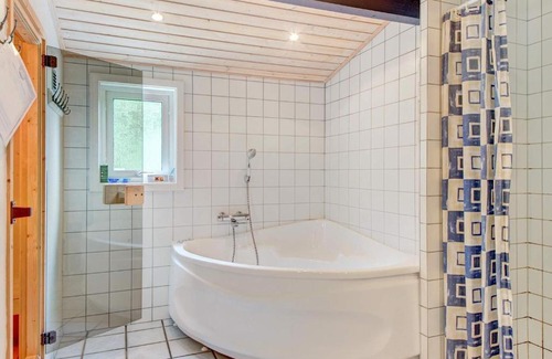 Oster Somarken House | Quaint Holiday Home in Aakirkeby with Whirlpool