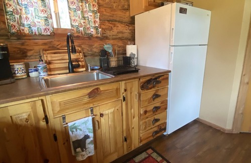 Coram Cabin | Quaint Log Cabin with River View. 7 miles to the entrance of West Glacier