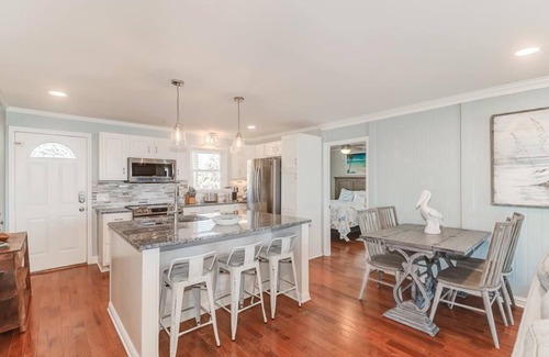 Folly Beach House | Quaint Oceanfront Pet Friendly House with Screen Porch, Deck & Direct Beach Access