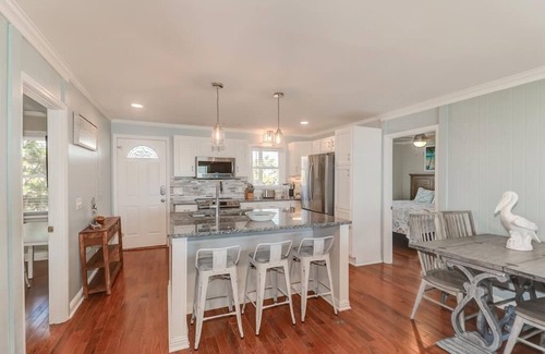 Folly Beach House | Quaint Oceanfront Pet Friendly House with Screen Porch, Deck & Direct Beach Access