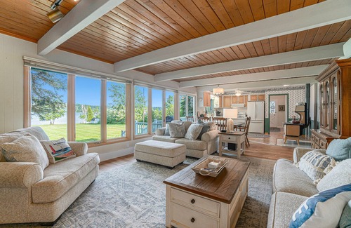 Lake Leelanau House | Quaint waterfront home with beach, dock, sweeping views, fast WiFi & W/D