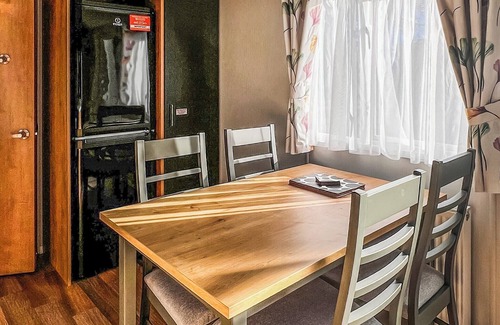 Chester House | Quality 12ft-wide caravan with one double and one twin.