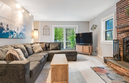 West Hartford House | Quechee Lakes home on three acres - trail access, fireplace, AC - dog-friendly