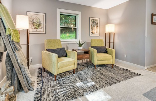 West Hartford House | Quechee Lakes home on three acres - trail access, fireplace, AC - dog-friendly
