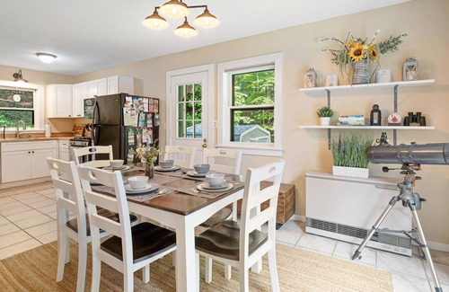 West Hartford House | Quechee Lakes home on three acres - trail access, fireplace, AC - dog-friendly