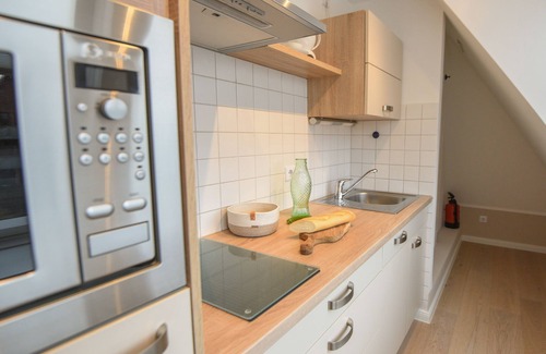 Norderney Apartment | Quiet and relaxation in the archway houses of the northern helmet settlement.