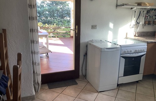 San Teodoro Apartment | Quiet apartment, large terrace on the mountainside, sea view, WiFi, garden, green energy