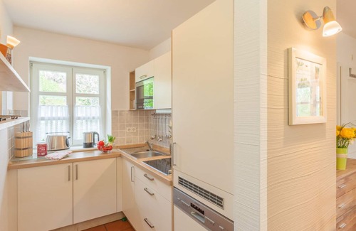Kreptitz Apartment | quiet apartment near the beach on the ground floor + DG with garden incl. Indoor swimming pool /sauna etc.