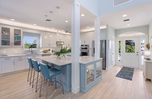 Anna Maria House | Quiet Canal Home, Walking Distance to Bay Beach, Heated Pool!