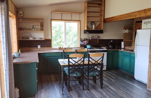 Knik River Bed & Breakfast | Quiet country living in this spacious 2nd story Unit. Hiking trails and more!n