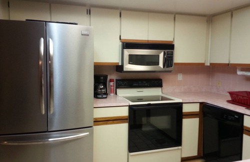 Hudson House | Quiet Gulf Canal Neighborhood with Enclosed Lanai & Heated Pool EV friendly