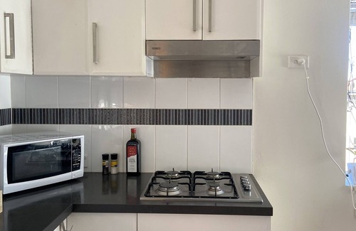 Kingsford Apartment | Quiet With Views on Trees, 3 Dedicated Working Spaces, Steps From Lightrail