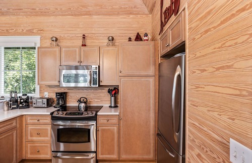 Cape Fear Station House | Quiet, Wooded Sanctuary - Near Sunrise and Sunset Beaches - Dog Friendly