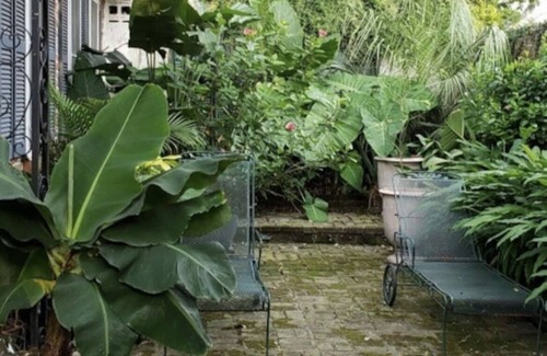 French Quarter Apartment | Quintessential French Quarter Cottage with Lush Courtyard