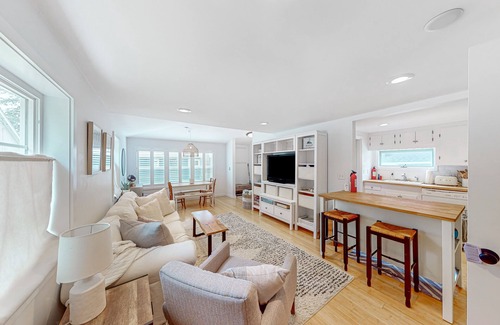 Meredith Cottage | Quintessential lakeside cottage with swimming, picnic tables, & mountain view
