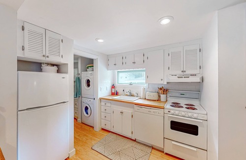 Meredith Cottage | Quintessential lakeside cottage with swimming, picnic tables, & mountain view