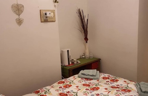 Koppanyszanto Bed & Breakfast | Quirky, character guestroom in loam cottage in rural Hungary with outdoor pool