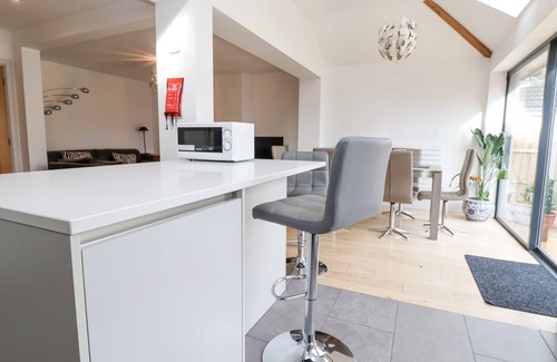 Rowton House | RAINBOWS END, with a garden in Christleton