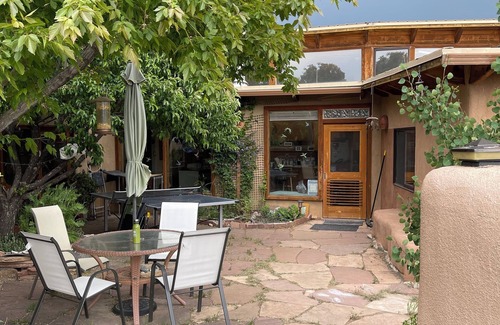 Arroyo Hondo House | Rainbows, Rivers and Sunsets: Unique off-grid solar 3-bedroom home in El Prado