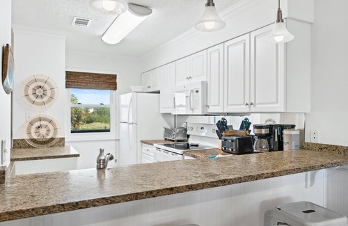 Sunnyside Condo | Ramsgate Harbour F49 - Beachfront, VIP Beach Service Incl - Pool, Free Golf Incl