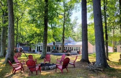 Rapid City Cottage | Rapid River Retreat riverfront close to Torch Lake