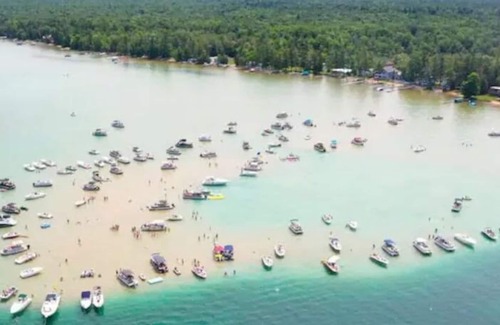 Rapid City Cottage | Rapid River Retreat riverfront close to Torch Lake