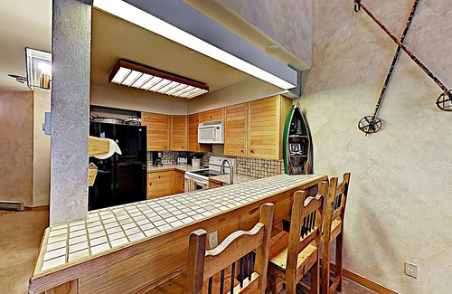 Mountain House Condo | Rare mountain condo with fireplace & washer/dryer - pool, hot tub & sauna access