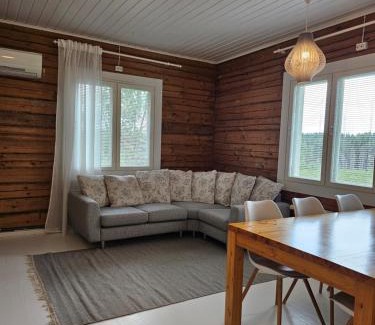 Muurame Apartment | Rauhallinen asunto maalla, navetan päädyssä.